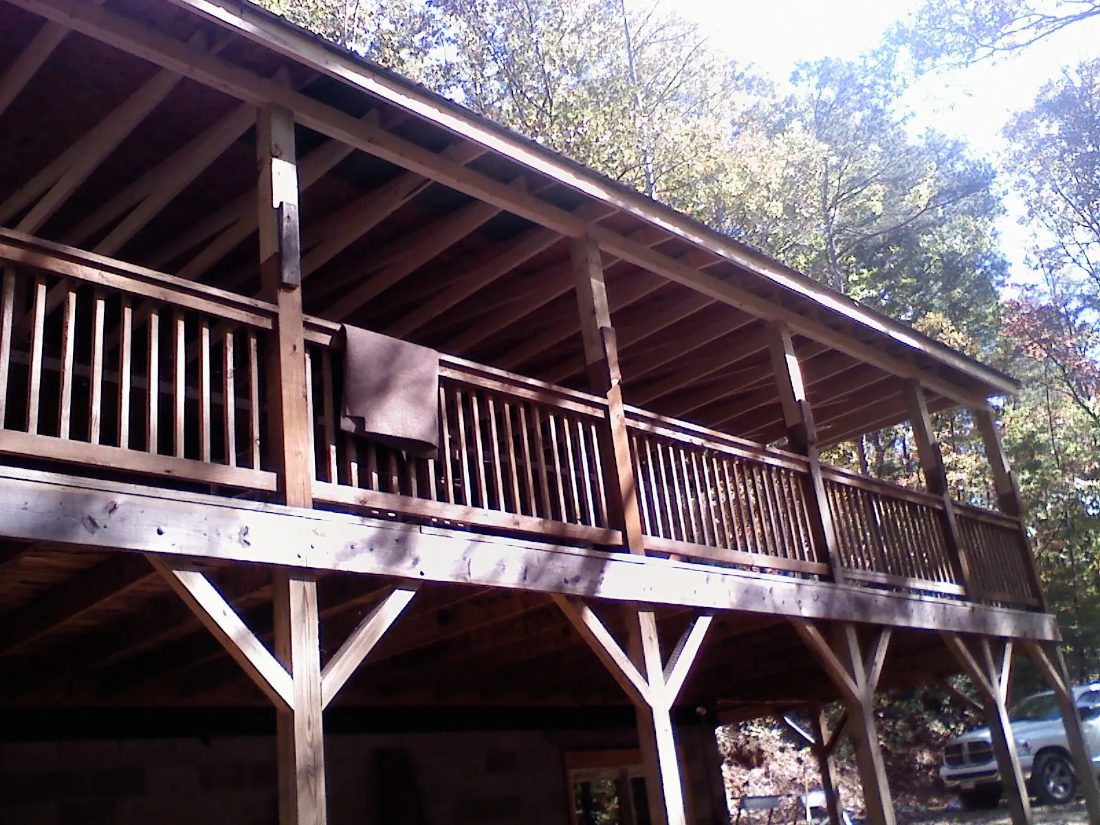 Timber framing under a new elevated porch and deck — Roof Leak Repair in Gilcrest by Roofing Brothers